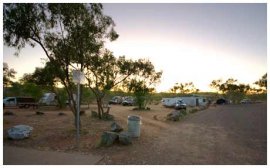 caravanners huddled around rest area